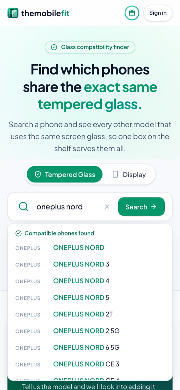Typing oneplus nord in TheMobileFit's search box suggests OnePlus phones under Compatible phones found, each opening its glass card.
